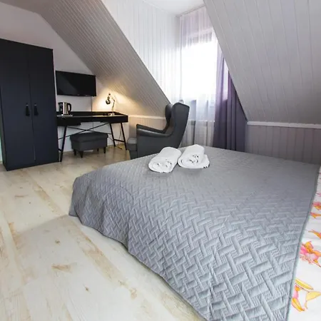 Gosciniec Pod Lipa Quarto em Acomodações Particulares Mikołajki