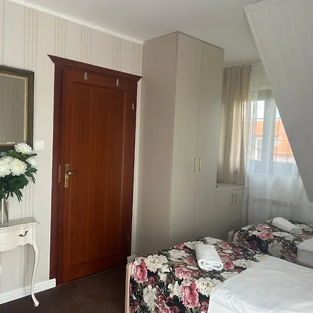 Gosciniec Pod Lipa Quarto em Acomodações Particulares Mikołajki